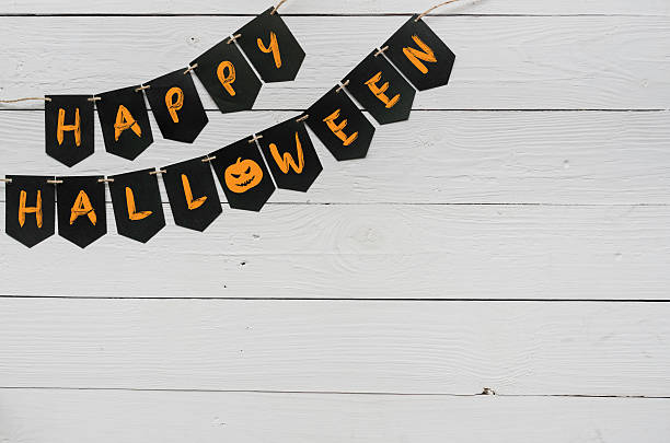 istock Handwritten happy halloween banner lettering 615517154