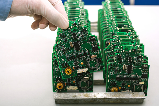 Microchip production factory. Technological process. Assembling the board. Chip. Manufacturing. Engineering.