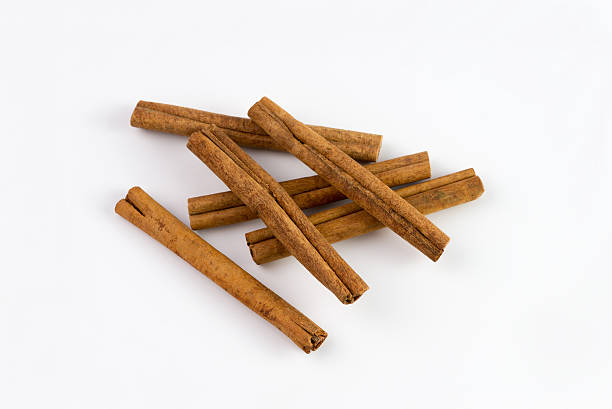 istock Pile of cinnamon on white background. 615521010