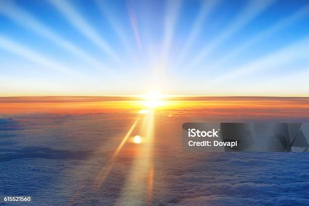 Sun Sunset Blue Sky And Ocean Of Clouds Stock Photo - Download Image Now - Planet Earth, Dirt, Above