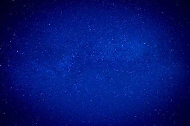 istock Blue dark night sky with many stars 615522438