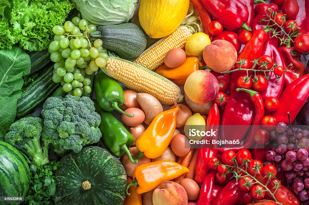 Fruits and vegetables overhead assortment on colorful background Fruits and vegetables overhead assortment colorful background green, yellow to red Vegetable Stock Photo