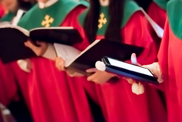 istock Choir singing Christmas carols 615523308