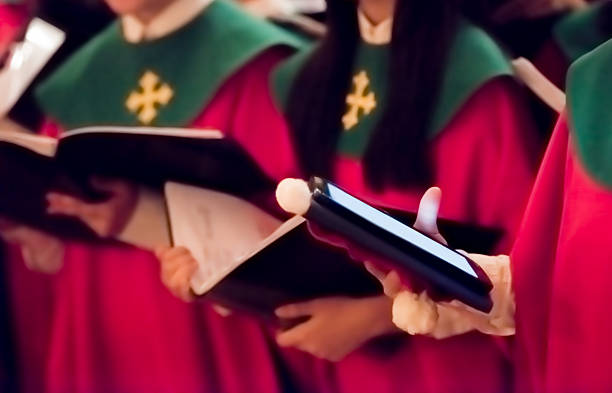 istock Choir singing Christmas carols 615523374