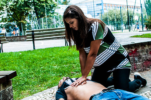 istock Cardiac massage in the park 615523390