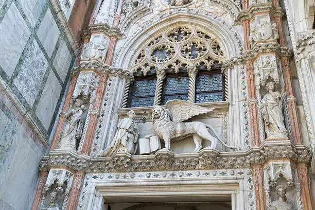 Bas-relief on Porta della Carta of Doge's Palace in Venice, Italy.