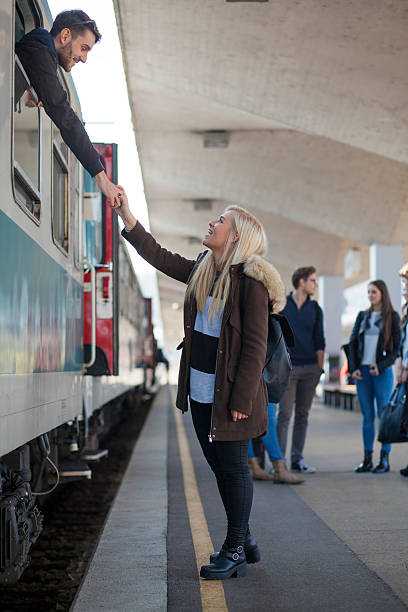 istock Saying goodby to her boyfriend at train 615594634