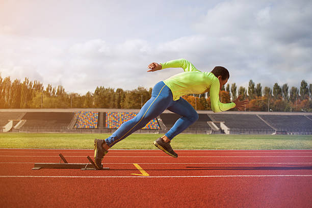 istock Running african man at stadium 615595414