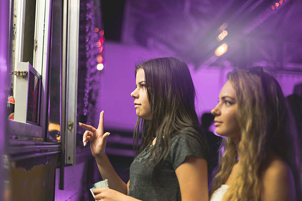 teenagers buying ticket