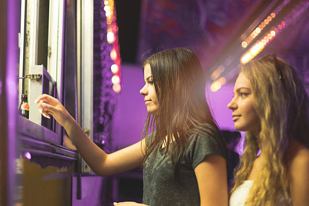 istock teenagers buying ticket 615595962