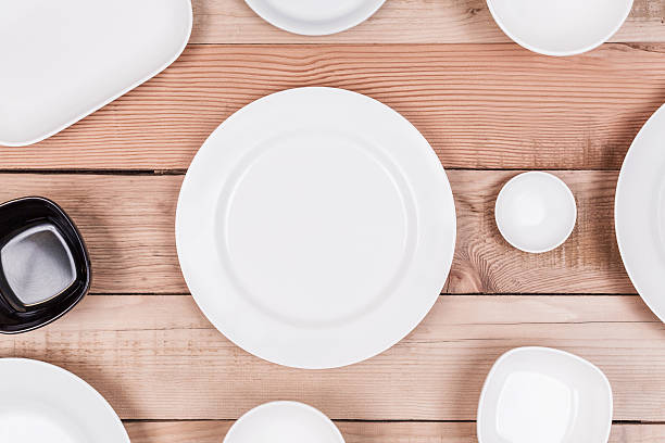 istock Top View Group of Empty Dish On Wood Background Textured 615596776