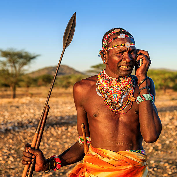 istock Samburu tribe warrior using mobile phone, central Kenya, East Africa 615596984