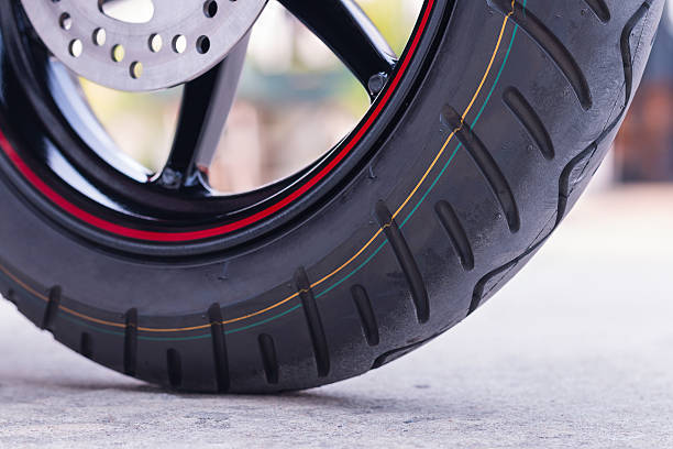 istock Wheel motorcycle on the road. 615599064