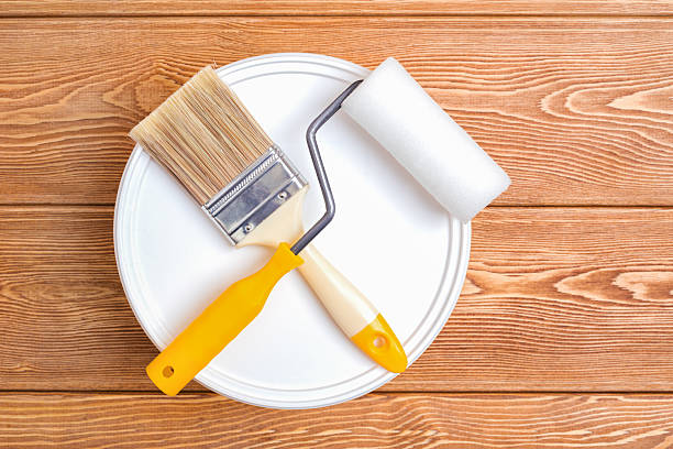 istock Bank of paint, paint brush and paint roller 615600770