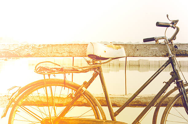 istock Rusty bicycle retro on wooden bridge with vintage style 615601808
