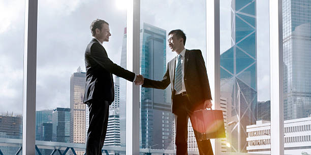 istock Asian Business Handshake Agreement Partnership Concept 615604392