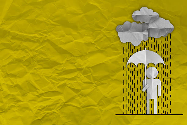 istock people with rain umbrella paper cut 615604694
