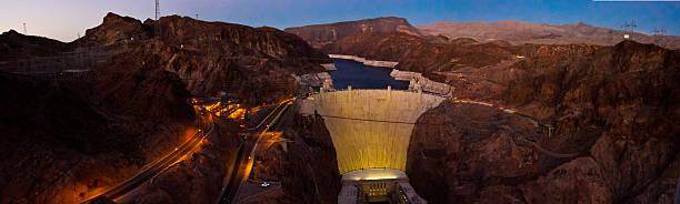 Hoover dam night panorama Hoover dam night panorama glen canyon dam stock pictures, royalty-free photos & images