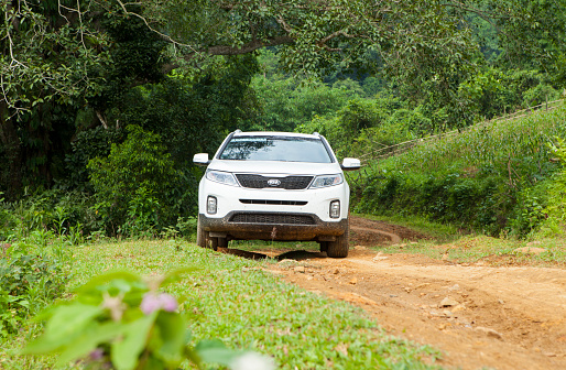 Hoabinh, Vietnam - Jun 3, 2014: Kia New Sorento car is running on the mountain road in test drive, Vietnam.
