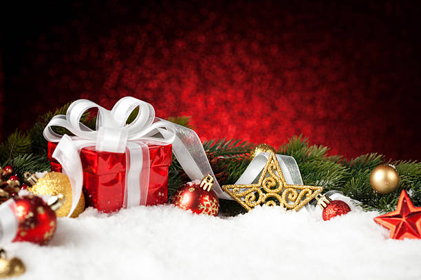 istock Christmas gift with decoration on snow 615608562