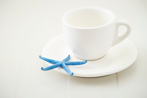 Coffee cup with starfish