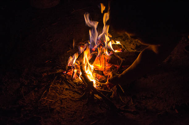 istock coals of a campfire in the forest 615610768