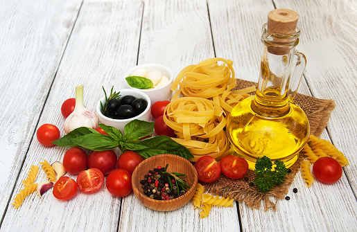 italian food ingredients on a old wooden background