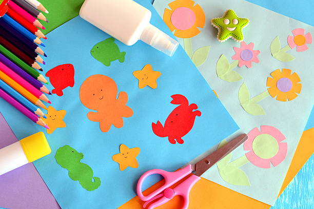 istock Paper octopus, fish, starfish, crab, flowers 615613266