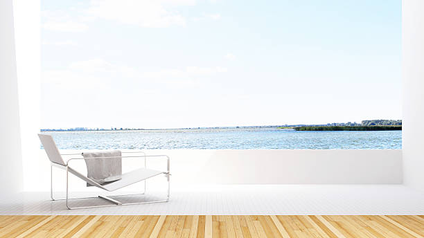 istock lake view and daybed on terrace - 3D Rendering 615613760