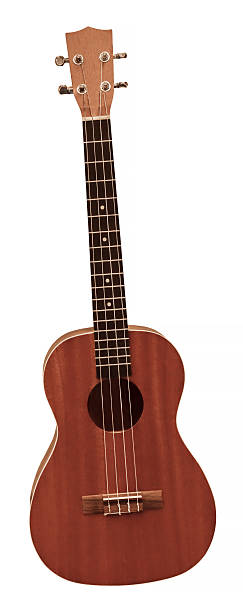 istock Brown ukulele, isolated on the white background 615618450
