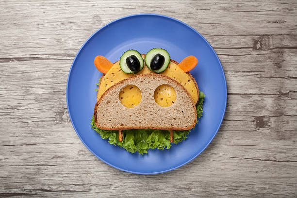istock Hippo made of bread and vegetables on board and plate 615618620