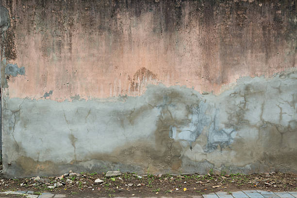 istock Urban street wall with dirty and old background 615620090