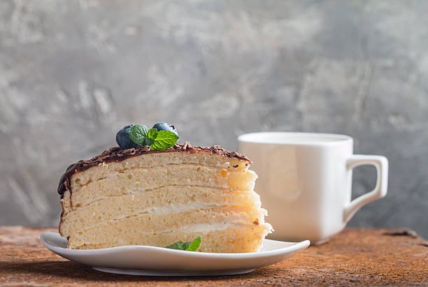 istock Piece of delicious sponge cake 615624530