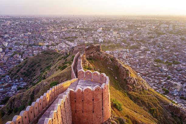 Nahargarh Fort Aerial view of Jaipur from Nahargarh Fort at sunset jaipur stock pictures, royalty-free photos & images