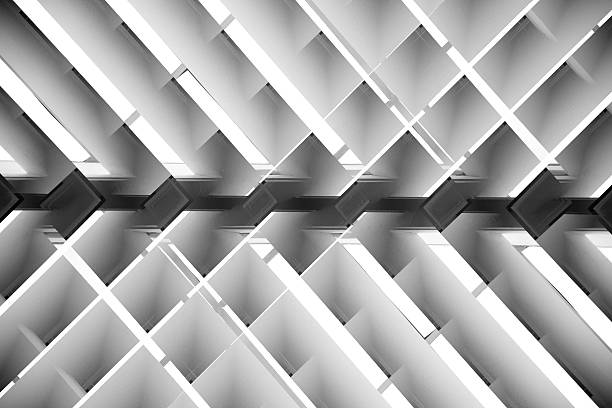 Black and white close-up photo of brightly lit lath ceiling Brightly lit lath ceiling / roof. Abstract background photo on the subject of hi-tech architecture and interior. architectural feature stock pictures, royalty-free photos & images