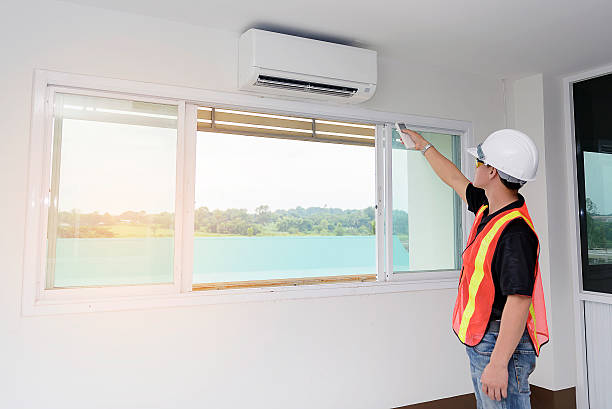 istock Technician - Engineer investigate Repairing Air Conditioner 615627896