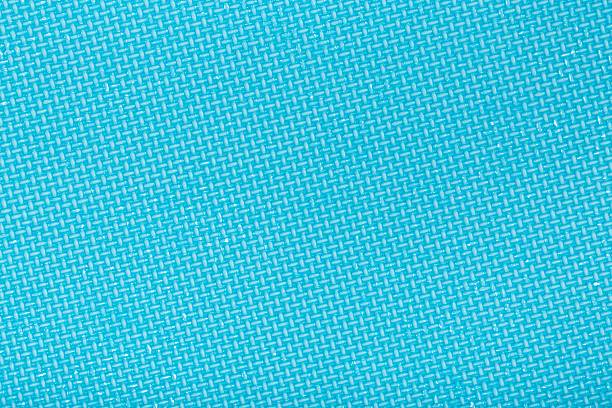 istock Blue colored mat for children. Diagonal lines.Closeup 615628832