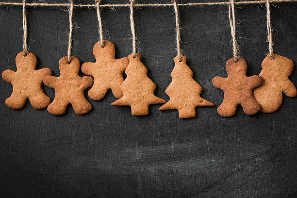 istock Christmas background with fir tree,Gingerbread Cookies and holiday decor 615628862