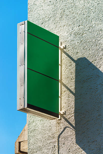 istock Retail store blank green square signboard as copy space 615629330