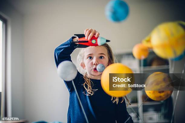 Playing The Astronaut Stock Photo - Download Image Now - Child, Girls, Science