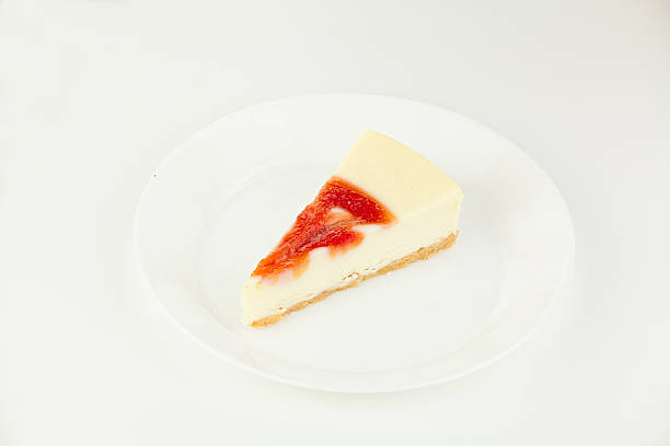 istock delicious cheesecake with strawberries 615629690