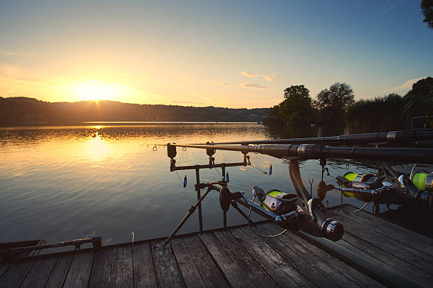 istock Fishing on the lake sunset 615630306