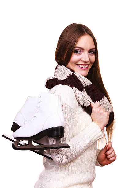 istock Attractive girl with ice skates. 615631618