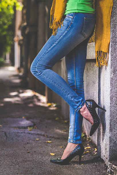 istock Woman and her high heel shoes 615632032