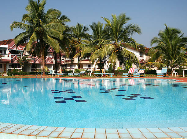 istock Swimming pool and houses 615632318