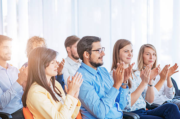 istock People applauding on seminar 615632416