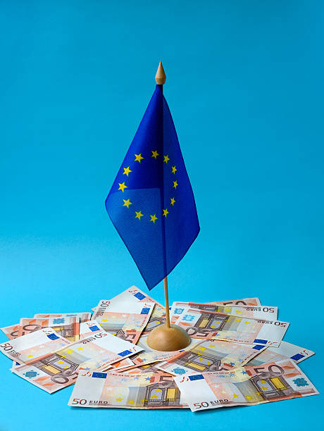 istock Europe Union flag on the Euro notes 615632470
