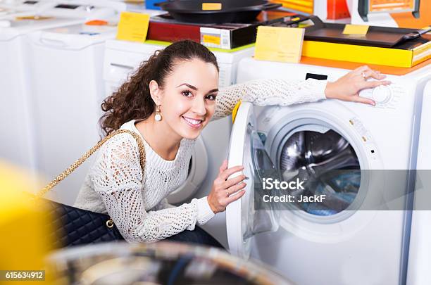 Customer Looking At Washers Stock Photo - Download Image Now - Shopping, Retail, Dryer