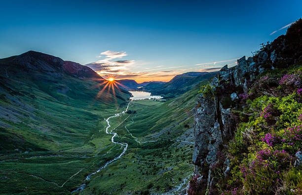 Sunset over Buttermere Sunset over Buttermere, The Lake District, Cumbria, England cumbria stock pictures, royalty-free photos & images