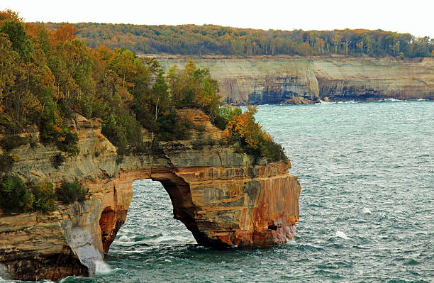 istock Lovers leap arch in pictured rocks national lakeshore 615637108